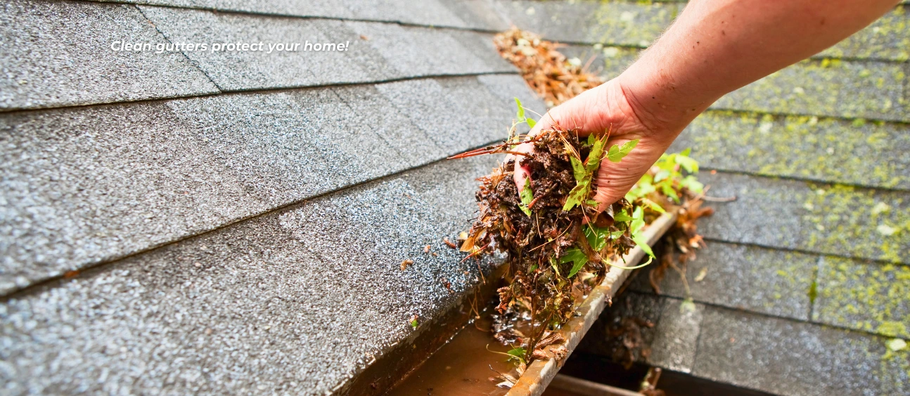 Cleaning gutters by hand