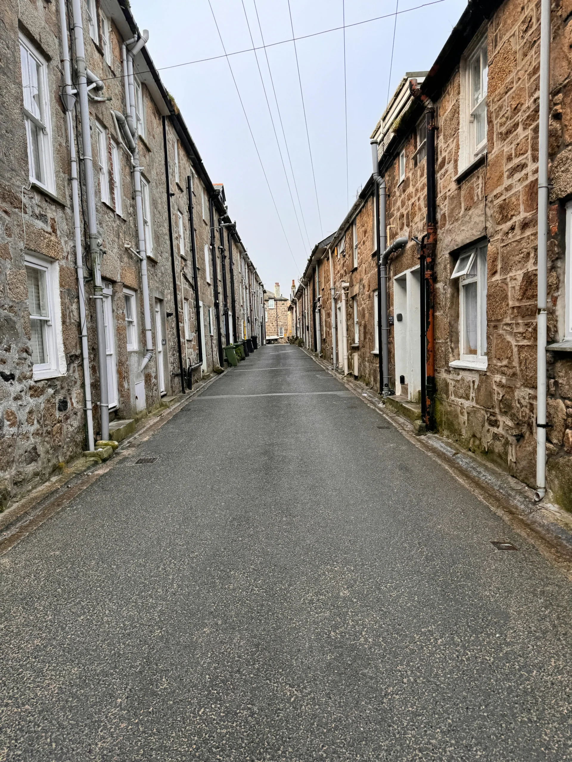 A street containing a common English house demographic for gutter cleaners.