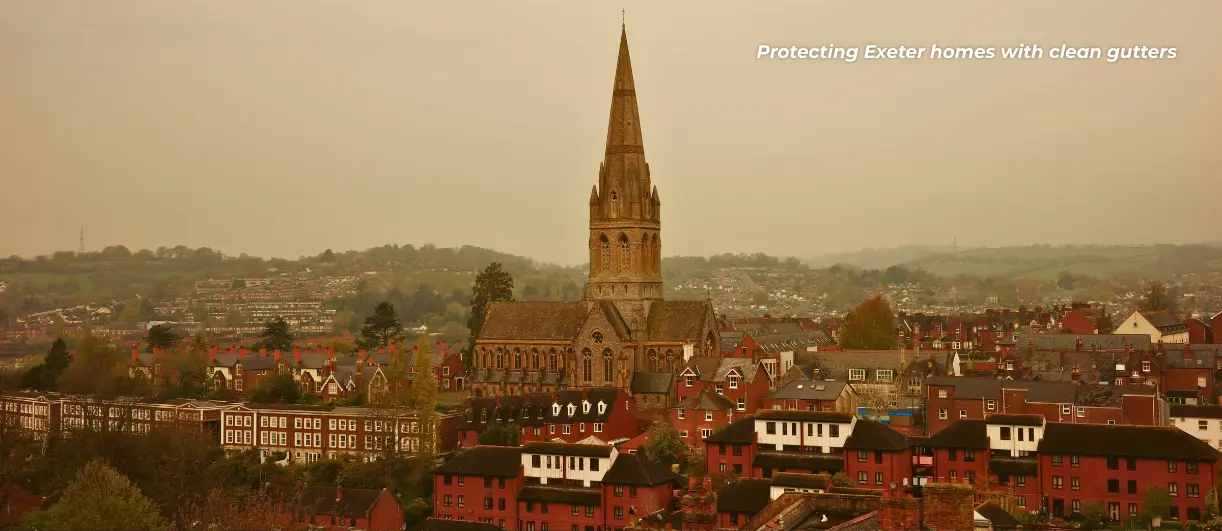 An aerial landscape image showing Exeter and roofs of gutters that need cleaning in the area.