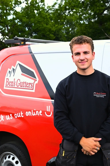 one of our gutter cleaners standing by company vehicle in Yateley