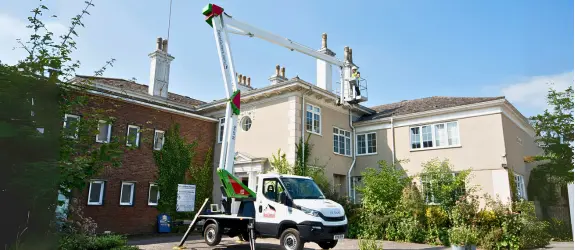 using our cherry picker on a commercial gutter cleaning job in Yateley