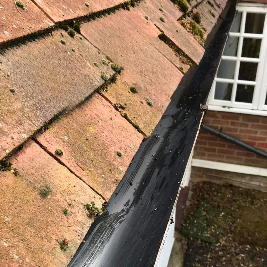 after image of a clean gutter empty of dirt